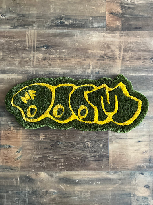 Green and yellow tufted graffiti style MF DOOM Rug by The Woollers