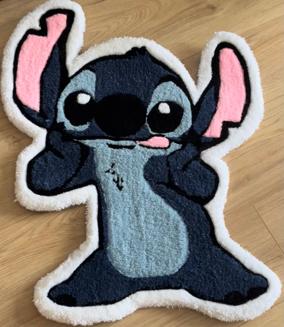 Shows our tufted rug of the Stitch character from the Disney movie Lilo and Stitch. Made by The Woollers